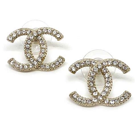 Boucles d'oreilles Chanel d'occasion .